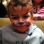 Tiger face paint.