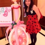 Cory with a Giant princess balloon sculpture.  
