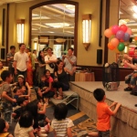 Family stage show for AIA in Hong Kong. Joker performs a trick with disappearing sponge balls.