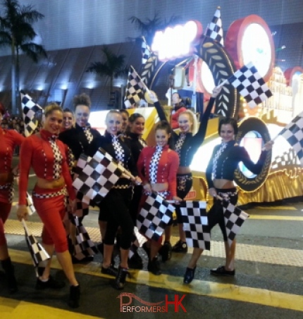 Models dressed as cheerleaders for the Hong Kong Chinese new year Parade