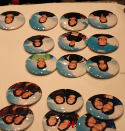 The badges with the photo on site, as a give away for the guests at the annual dinner