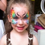 Lovely butterfly face painting.
