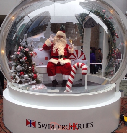 Santa clause inside a giant snow globe in Hong Kong