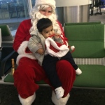 Santa Rowan with his little fan at the airport
