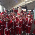 Santa with his helper with gifts 