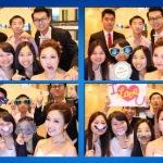 A group using props from photobooth team taking fun pictures at an event at a wedding event.