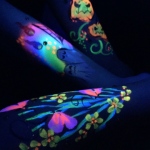 UV face painting,glowing under UV light.