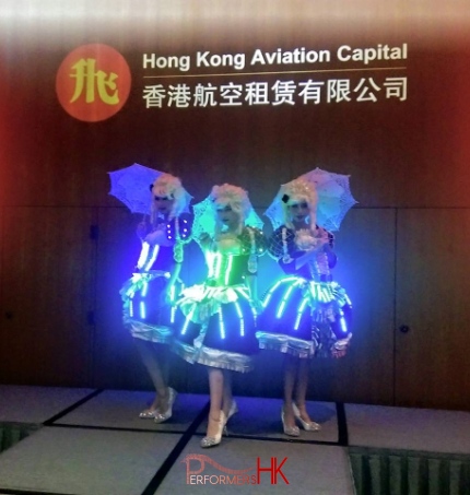 Three Model dancer posing with three little lace umbrella at a Hong Kong corporate event