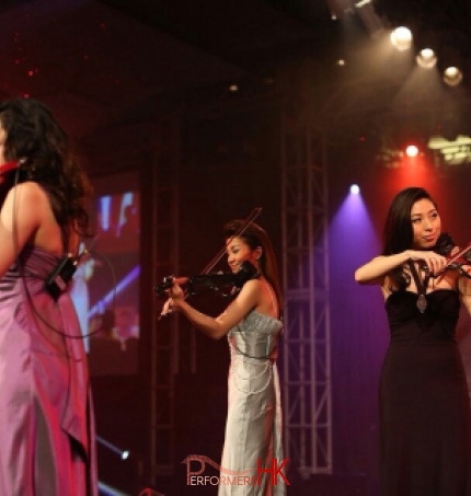 Three Hong Kong violinist performing electric trio at a watch company product launch event