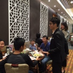 Jack using magic to bring joy to families at Tao Heung restaurant. 