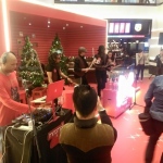 Our drummer tapping along to DJ at the Mira Mall Hong Kong. 
