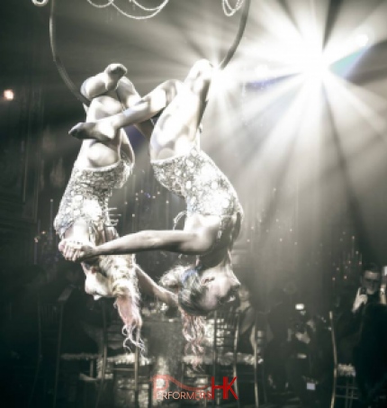 Two HK Aerial Chandelier performer hanged upside down on the grand chandelier pops at a corporate event