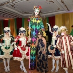 The Venetian LED Stiltwalker with Maries Marionette at a Masquerade ball.