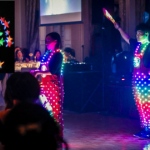 Performers in LED costumes.