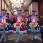 Our three dancers in the Grand hallway of the Island Shangri-la  Hong Kong rehearsing before corporate show.