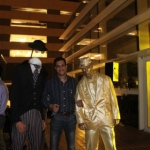 Headless man along with gold living statue performing for the Reliance Group in Macau.