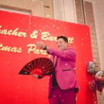 Josay performing snow storm trick at a Christmas party. 