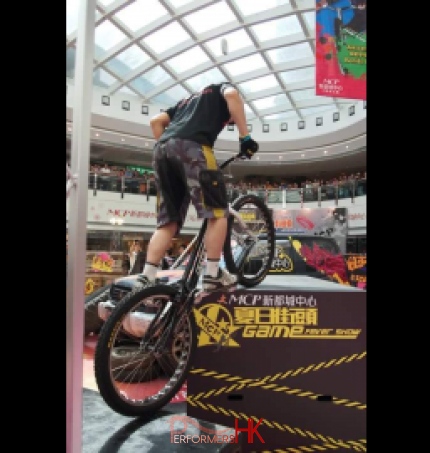 Hong Kong trial bike professional performer performing at a shopping mall summer function