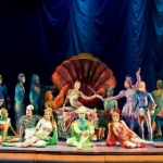 Contortion and handbalancing artists posing at the end of their show. 