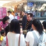 Working the crowds at the Popcorn mall in Hong Kong.