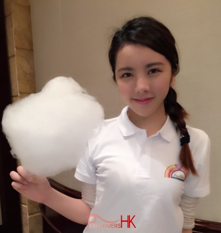 Model holding candy floss with clean white top 