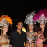 Three Brazilian Dancers Roving meet and greet a gentleman at corporate function for Hong Kong Indian Association
