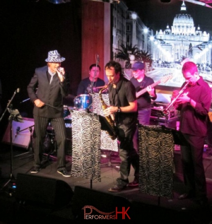 A live music performance featuring different instruments in Hong Kong