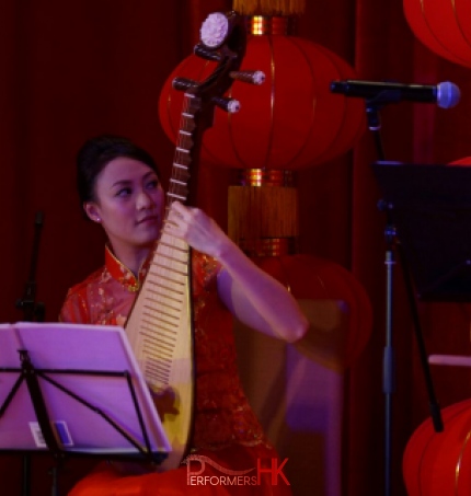 A Musician playing Chinese tradition instrument, Pipa , at a Hong Kong Bank Annual dinner event