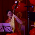 A Musician playing Chinese tradition instrument, Pipa , at a Hong Kong Bank Annual dinner event