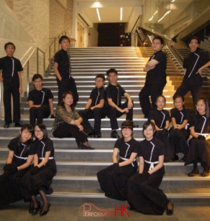 The Bells and Chimes player and the conductor taking picture on the stairs