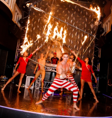 Five talented fire performer in Hong Kong performing with fire staff and fire cube at a night club store opening event  