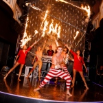 Five talented fire performer in Hong Kong performing with fire staff and fire cube at a night club store opening event  