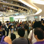 Jack performing at Citylink and attracting a large crowd.