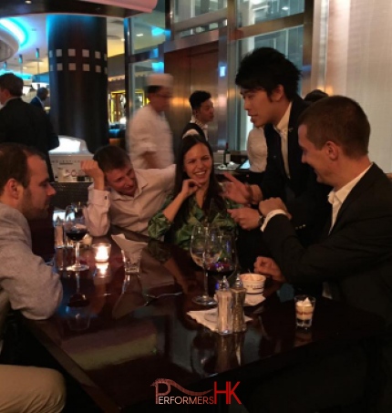 Hong Kong magician performing table magic at CFA Corporate event at peak