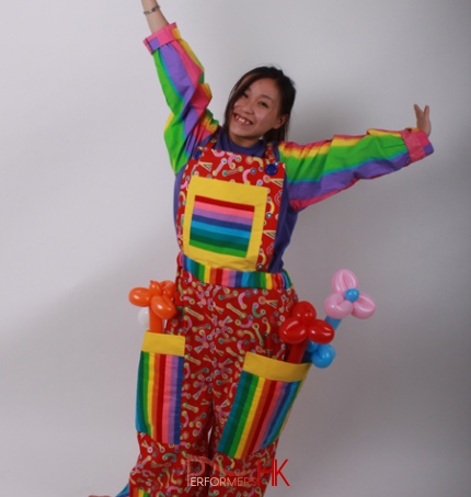 Hong Kong female roving balloons clown in a colorful clown costume for a corporate festival event