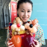 Corey showing off her wonderful balloons animals.