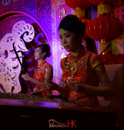 Two Chinese music musician playing Erhu and Yangqin at a Hong Kong Bank annual dinner