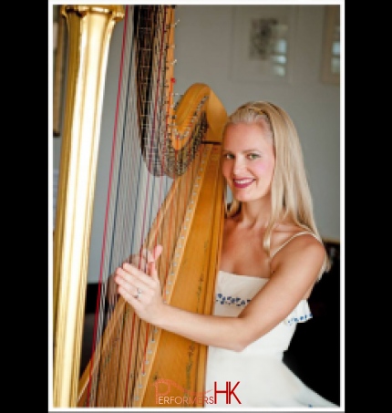 Hong Kong Harpist performing in a white dress at a corporate cocktail party 