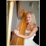 Hong Kong Harpist performing in a white dress at a corporate cocktail party 