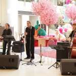 3 musicians playing in mall in HK. Sax, double bass, Keyboard trio 