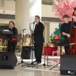3 live band performers in Hong Kong performing at a corporate event
