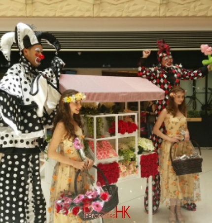 Two stilts walkers at Elements Shopping mall in Kowloon Hong Kong