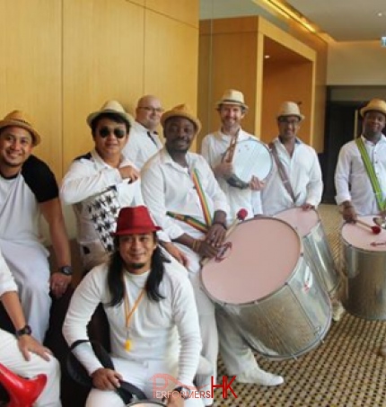 Samba drum team all dressed in white ready for action