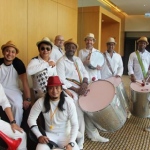 Samba drum team all dressed in white ready for action