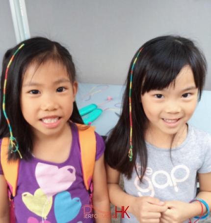 2 little girls with hair wraps