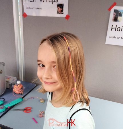 young girl with hair wraps