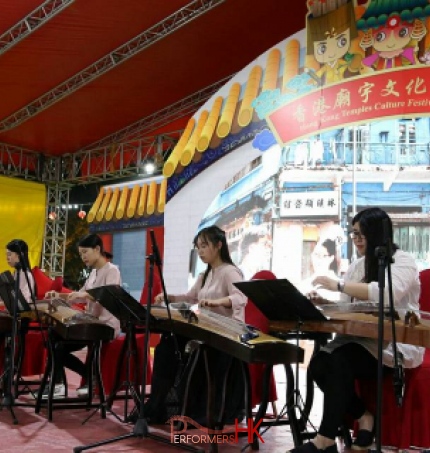 girl musicians playing their instruments
