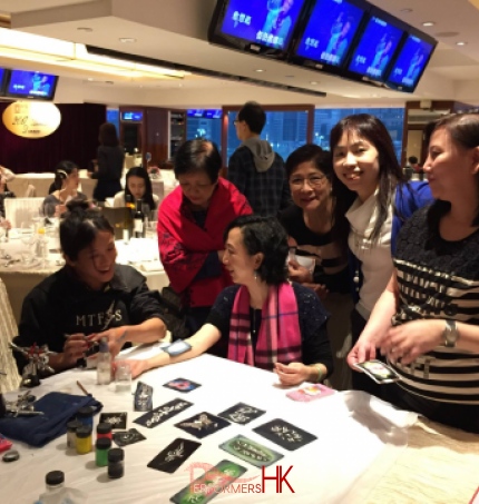 Guests at happy valley racecourse getting their tattoo done