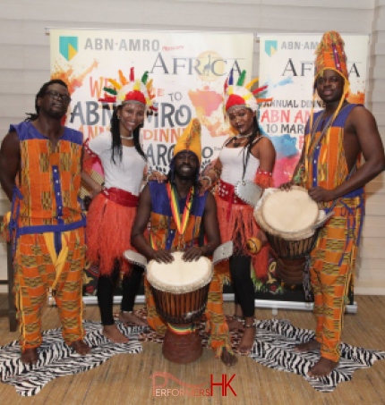 Dancers with drummers at event