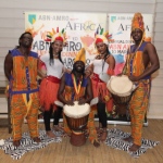 African drummers with dancers at annual dinner event 